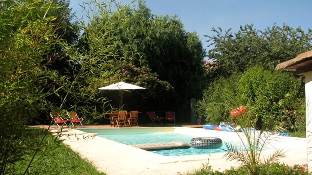 Maison avec balcon fleuri