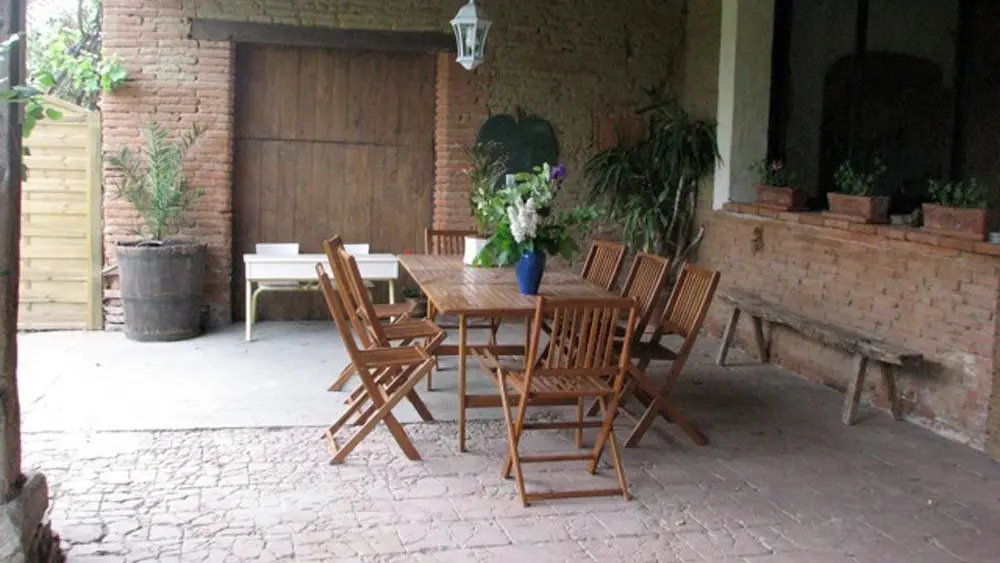 Maison avec balcon fleuri