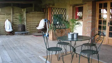 Maison avec balcon fleuri